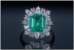 Platinum Diamond And Emerald Cluster Ring, the large central deep green emerald surrounded by 16