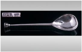 Chester Silver. An apostle top caddy spoon with spiral stem and pear shaped bowl. Hallmarked for