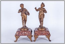 French After Augustan Moreau Pair Of Spelter Boy Figures. Circa 1900. Raised on marble style and