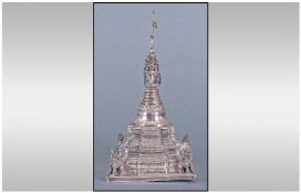 A Burmese Late 19th Century Silver Model Of A Temple Stupa, 180.3grams. 7" in height.