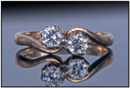 withdrawn   9ct Gold Set Two Stone Diamond Ring. The round brilliant cut diamonds of good colour.