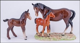 Two Beswick Horse Figures comprising Model no 953 Mare and Foal on base, model no 951 Shire Foal.