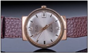 Gents MuDu Wristwatch. Silvered Dial, Gilt Batons With Date Aperture. 34mm Gilt Case Fitted On A