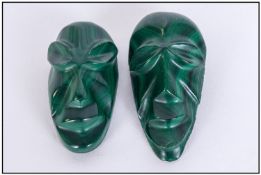 A Pair of Malachite Face Mask Pendants, probably from Zambia, Africa. Twentieth Century, 3 inches in