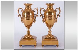 French 19th Century Pair Of Gilt Metal Two Handled Vases. Probably part of a clock garniture set