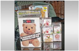 Collection Of Boxed Games/Toys. Comprising security bear car alarm disguised as a teddy beard, Elvis
