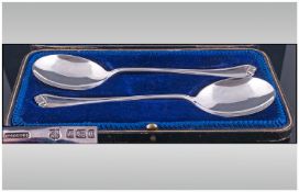 A Pair Of Silver Serving Spoons. Hallmark Sheffield 1912, with original period case, Blue velvet