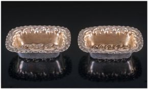 Pair Of Silver Embossed Bonbon Dishes. Rectangular form with gilt interior. Fully hallmarked