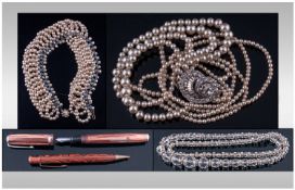 Collection Of Costume Jewellery. Comprising two simulated pearl necklaces, one with paste set clasp,