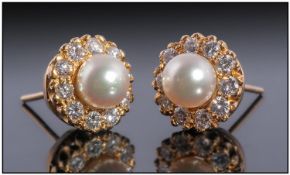 18ct Gold Pearl And Diamond Earrings, Set With Central Pearl Surrounded By 10 Small Round Cut