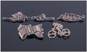 Collection Of Five Silver Brooches.