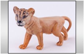 Beswick Lion Cub, model 1508, facing left. Designer Graham Tongue, 5.75 inches. Issued 1967-1984.