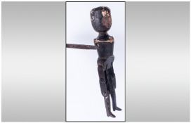 An Antique Wood Puppeteers Figure, unclothed, with movable legs.