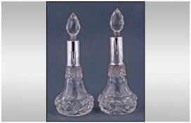 Edwardian Pair Of Silver Collared Cut Glass Perfume Bottles, complete with stoppers. Hallmark London