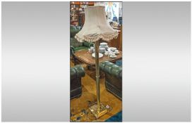 Brass Standard Lamp, with cream shade with tassels. 62 inches high.