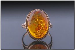 9ct Gold Amber Set Dress Ring. Fully hallmarked. Ring size R.