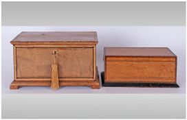 Two Desk Organizers comprising leather clad box,11.5 by 7 inches, fall front to reveal a two