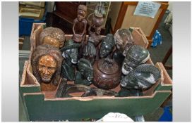 Collection of African Carved Busts in soft or reconstituted stone, 7 in a green dark grey granite