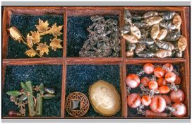 Rosewood Jewellery Box containing an assortment of costume jewellery, mainly beads and brooches.