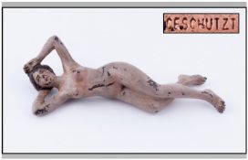 Late Nineteenth Century, Cold Painted Bronze of a reclining nude. Stamped 'Geschutzi'. 7.5 inches in