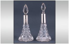 Edwardian Pair Of Silver Collared Cut Glass Perfume Bottles Of Tapered Form. Hallmark London 1904.