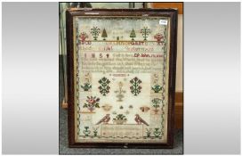 A Victorian ABC Sampler, made by Mary Martindale aged 12 years old and dated 1872. With some foxing.