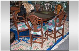 Reproduction Dining Table and 8 Chairs. The chairs comprising 2 carvers with floral upholstered