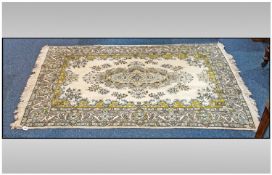 Small Floral Design Woolen Rug, pastel colours, greys and greens, 70 by 46 inches.