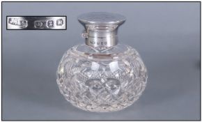 Silver Topped And Hinged Cut Glass Perfume Bottle. Complete with inner stopper. Hallmark
