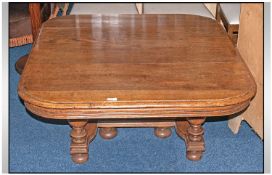 A Continental Oak Coffee Table, on turned legs and shaped stretcher base. Circa 1900. Height 19