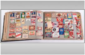 Album Containing a Collection of matchbox Covers from around the World.