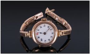 Ladies 9ct Gold Wristwatch, white porcelain dial, Arabic numerals. Fully hallmarked on a 9ct gold