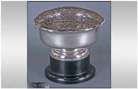A Silver Rose Bowl Of Good Quality. Raised on a stepped circular black bakerlite style plinth.