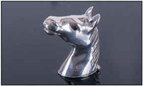 A Silver Vesta Case in the form of a horses head with glass eyes. Marked 9.25. 53.8 grams. 1.75