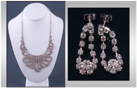 Clear Crystal Bib Necklace And Drop Earrings Set. Brilliant Austrian crystal set in a stylised bow