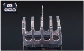 E Viner Silver 4 Tier Toast Rack, hallmark Sheffield 1937. Height   3 inches, width 3 inches. 53.7