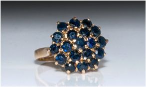 9ct Gold Set Sapphire Cluster Ring. Flowerhead setting. Fully Hallmarked. 4.5 grams.