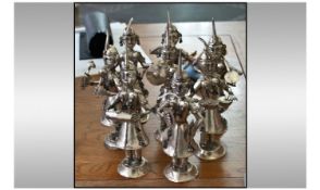 20th Century Interesting And Unusual 8 Piece White Metal Figure Band. All figures playing various