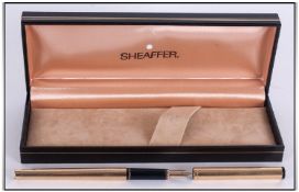 Sheaffer Eaton Gold Plated Slim Fountain Pen, with original box. Good condition.