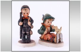 Two Hummel Boy Figures comprising one of a boy sitting down talking to a bird and one of a working