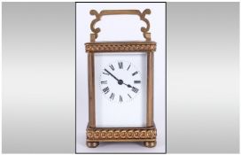 English Early Twentieth Century Brass Carriage Clock with visible escapement, 8 day movement.