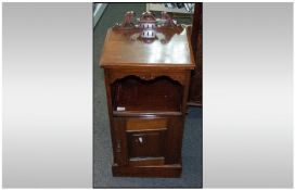 Shaped TopEdwardian Mahogany Shaped Bedside Cabinet, with cupboards below and shelf space above.