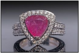 14ct White Gold Cluster Ring, Set With A Large Central Ruby Surrounded By Small Diamond Border And