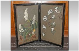 Black Framed Two Panel Fire Screen. Depicting floral painted decoration. Height 29.5 inches, total