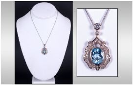 Victorian Style Diamond Pendant, Set With A Large Central Blue Faceted Stone Surrounded By Round Cut