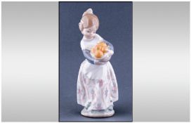 Lladro Figure Valencian Girl With Oranges. Model number 4841. Excellent condition. Height 6.5
