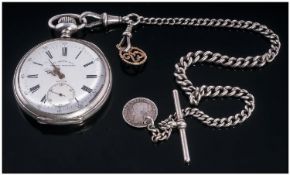 Zenith Van Arcken Silver Pocket Watch. Circa 1920's. Attached to a silver Albert chain and bar.