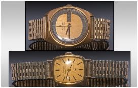 Gents Bulova Accutron Wristwatch. Gilt Dial With Silvered Bezel And Baton Numerals, Day/Date