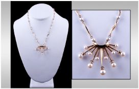 Ladies Designer 18ct Gold & Pearl Set Starburst Necklace/Pendant Drop. 18" in length. Marked 750.