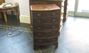 Early 20th Century Bow Fronted Chest Of Draws In The Georgian Style, with 5 slightly graduating